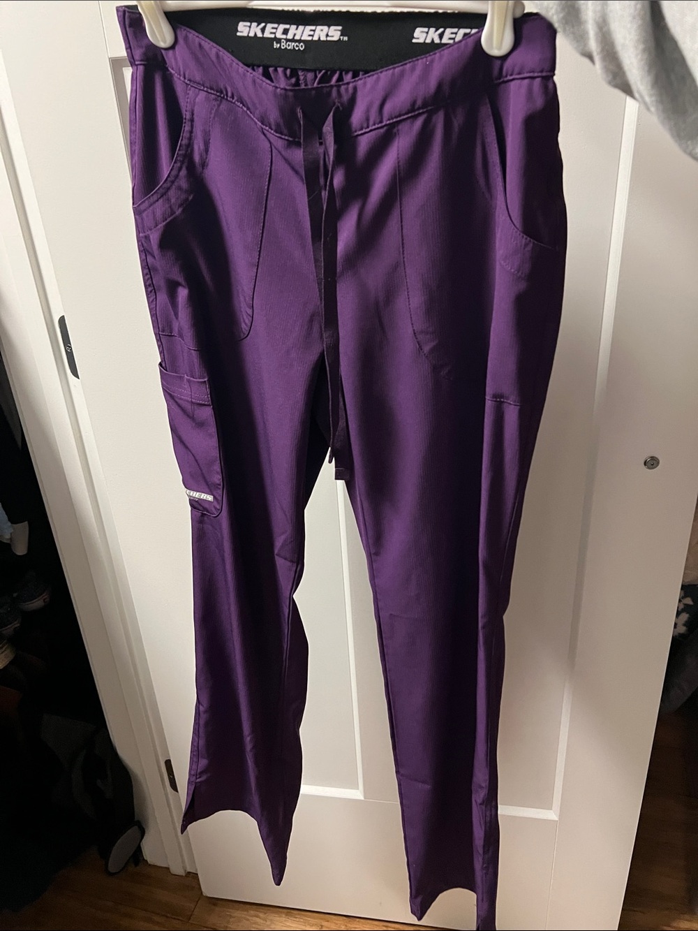 Purple Skechers scrub pants